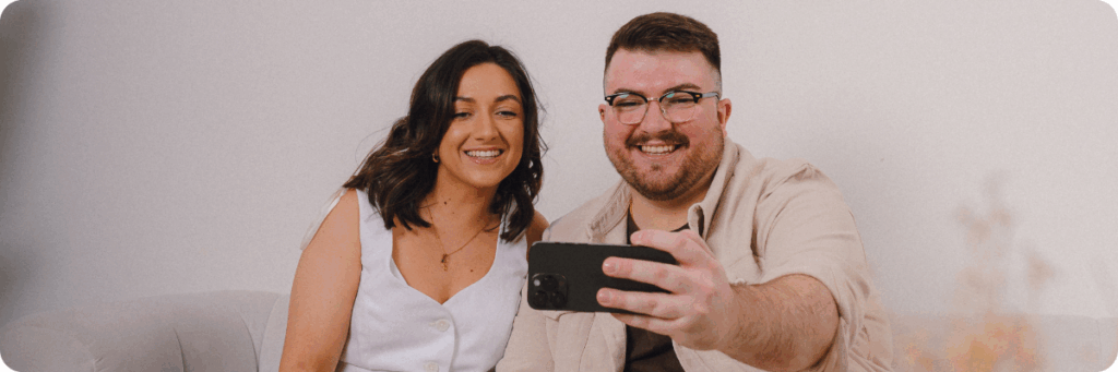 Sarah and Ross Powell, co-owners of The Business Tea talking to a marketing consultancy client through FaceTime.