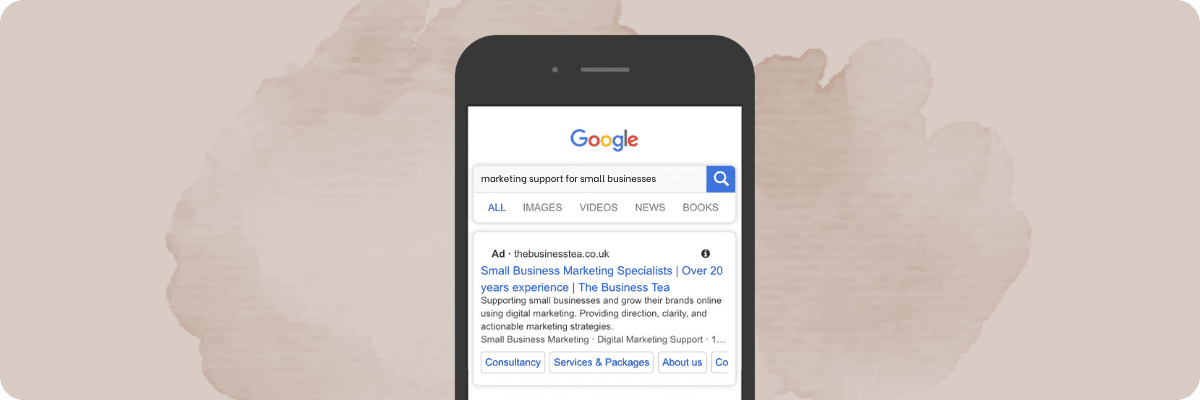 A mobile phone displaying a Google search result for marketing support for small businesses, highlighting The Business Tea as the first result.