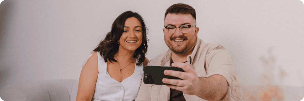 Sarah and Ross Powell, co-owners of The Business Tea talking to a marketing consultancy client through FaceTime.