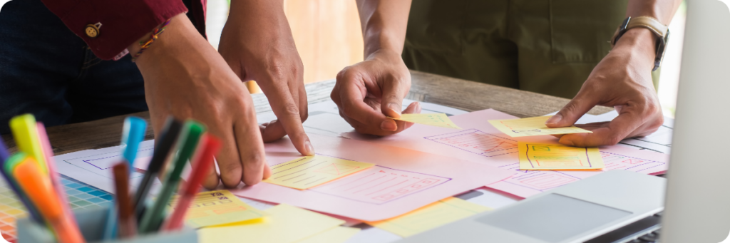 A growing business navigating the typical marketing challenge of prioritisation using sticky notes