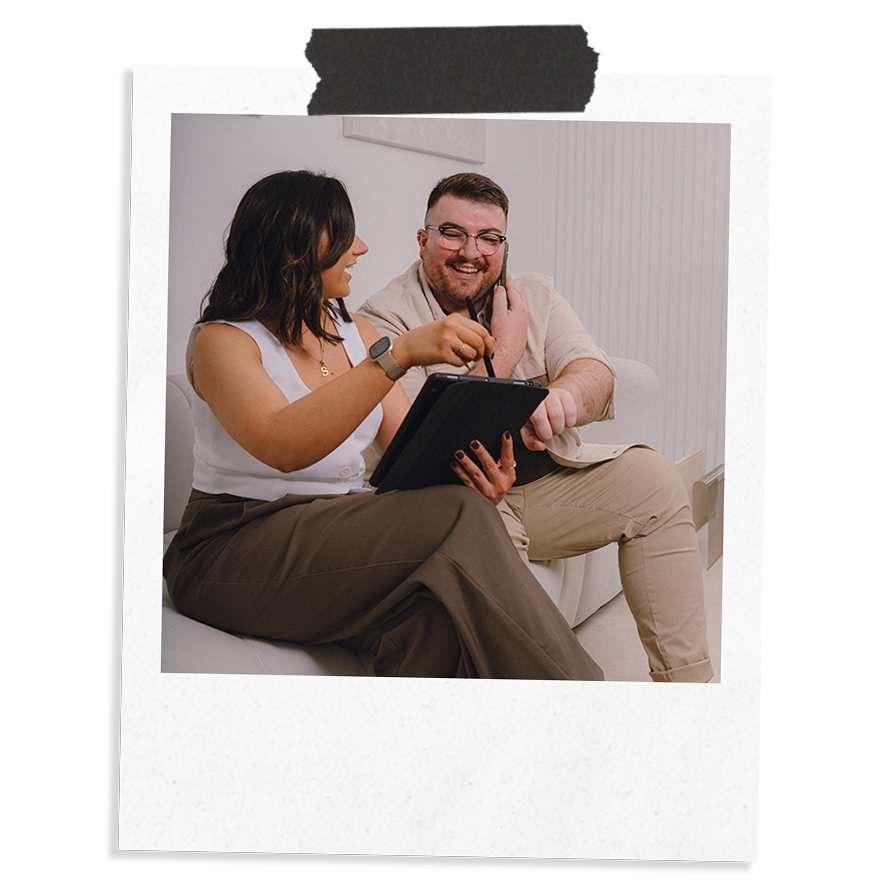 The Business Tea's Sarah and Ross Powell working on a paid media package for a client.