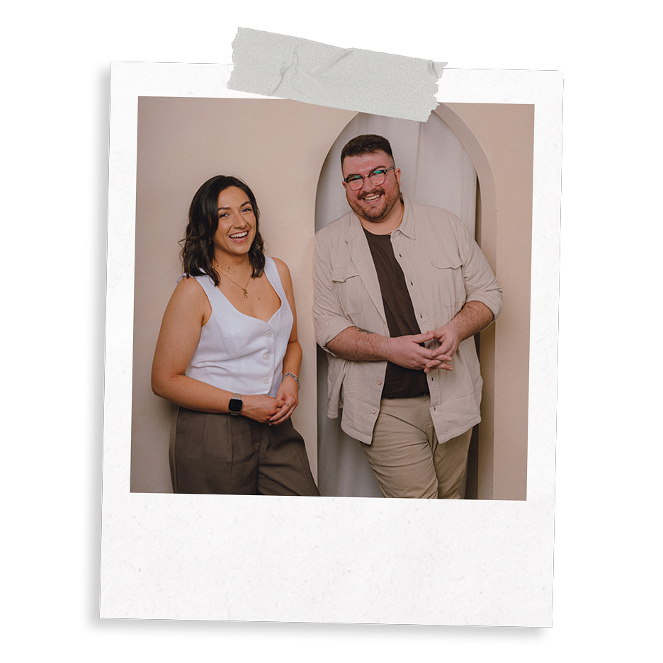 Digital marketing agency founders Sarah and Ross Powell, of The Business Tea. Photographed in an aesthetic studio environment, laughing in conversation.