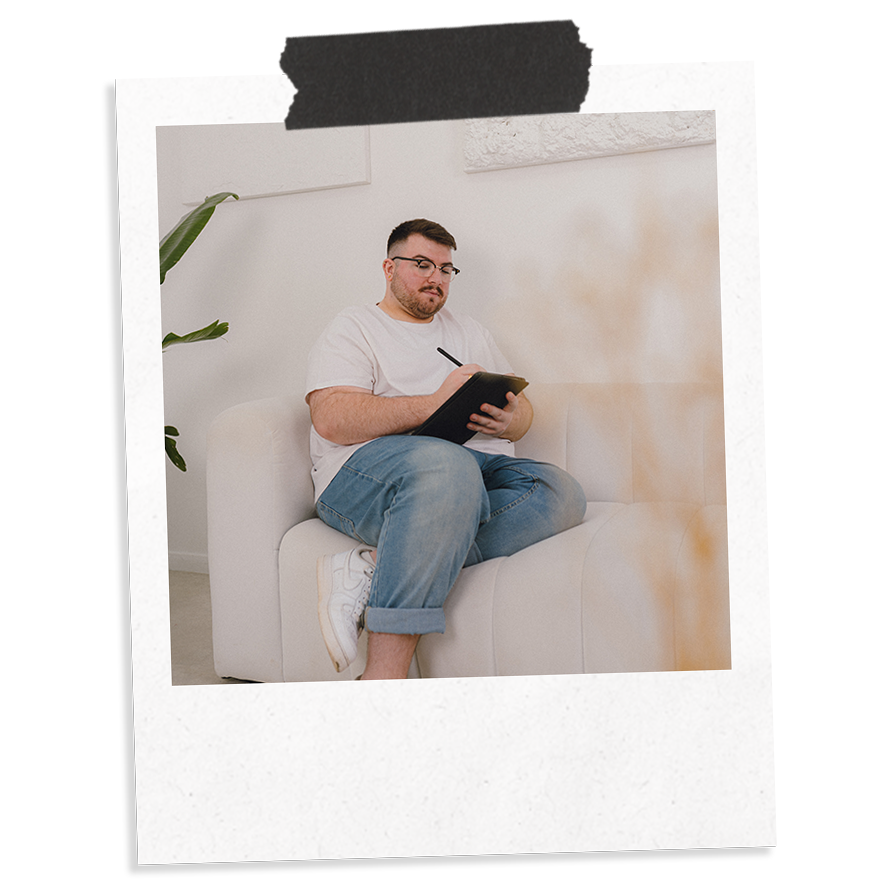 Ross Powell, Co-Founder of The Business Tea, making content amendments on an iPad as part of a content audit for a client.