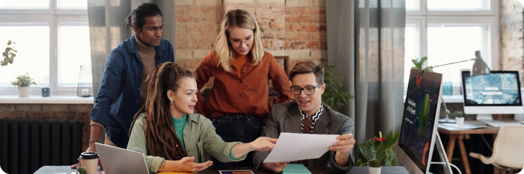 Outsourced marketing team planning work with a new client.